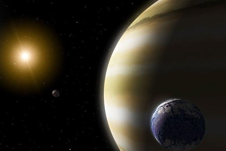 ricostruzione artistica di un pianeta esterno al sistema solare e la sua luna (fonte: Nasa) - RIPRODUZIONE RISERVATA