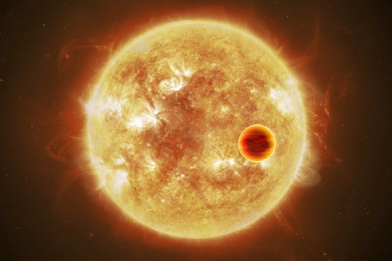 Rappresentazione artistica di un pianeta caldissimo in transito davati alla sua stella (fonte:  ESA/ATG medialab, CC BY-SA 3.0 IGO) - RIPRODUZIONE RISERVATA