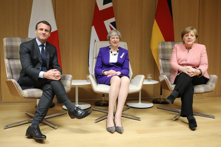 Emmanuel Macron, Theresa May , Angela Merkel - RIPRODUZIONE RISERVATA