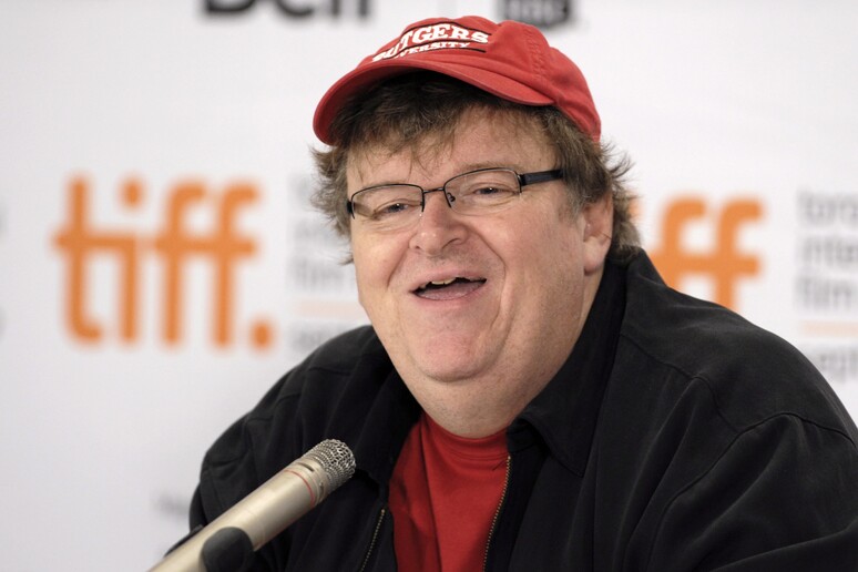 Il regista Michael Moore - RIPRODUZIONE RISERVATA