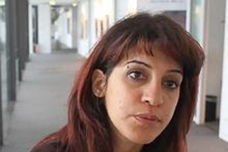 La blogger tunisina Lina Ben Mhenni in una foto d 'archivio - RIPRODUZIONE RISERVATA