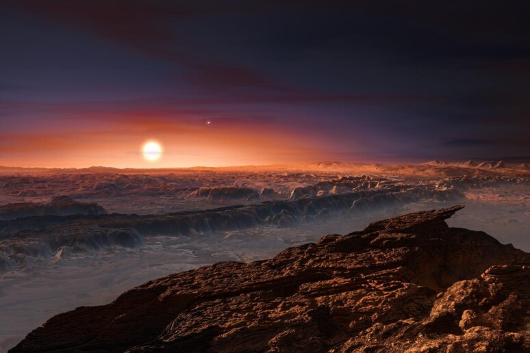 Rappresentazione artistica del pianeta Proxima Centauri b che  si trova in un sistema con tre stelle (fonte: ESO / M. Kornmesser) - RIPRODUZIONE RISERVATA
