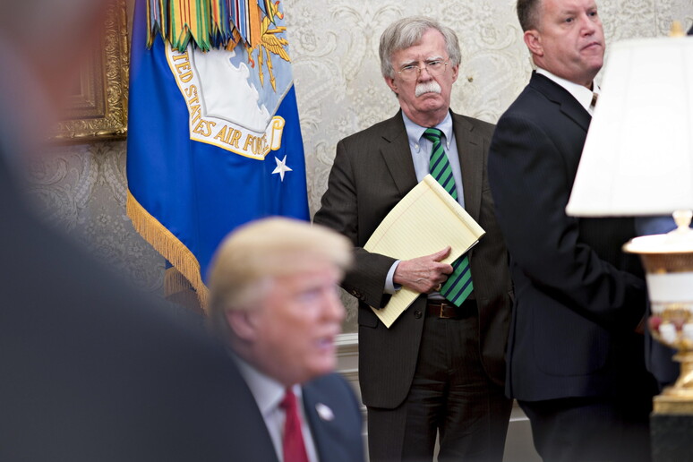John Bolton con Donald Trump © ANSA/EPA
