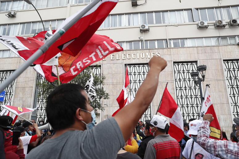 Followers of Pedro Castillo march in Lima © ANSA/EPA