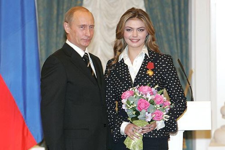 Vladimir Putin con Alina Kabaeva - RIPRODUZIONE RISERVATA
