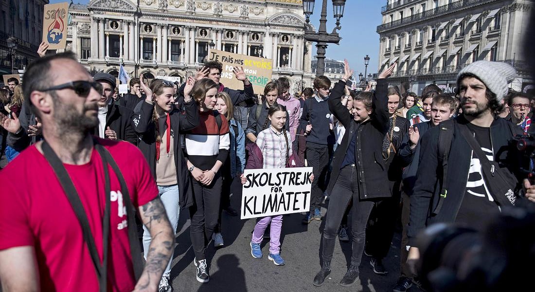 Students gather for a climate demonstration in Paris © EPA