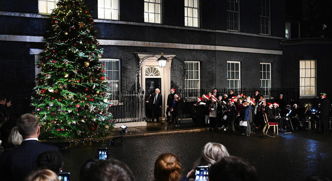 British Prime Minister Boris Johnson switches on Downing Street Christmas tree © EPA