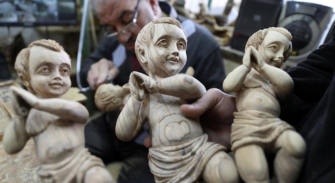 Wooden sculptures of Christian religious figures ahead of the Christmas celebration in Bethlehem © EPA