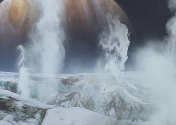 Rappresentazione artistica dei geyser su Europa, la luna di Giove che nasconde un oceano (fonte: Nasa Goddard Space Center) © Ansa