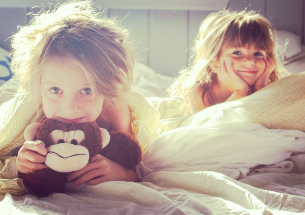 Orari fissi e nel loro letto, dai pediatri le regole del sonno © Ansa