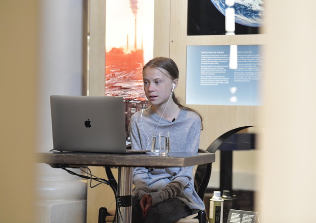 Greta Thunberg in video link conversation © EPA