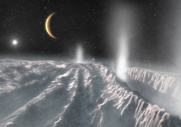 Raffigurazione dei pennacchi che fuoriescono dalla luna di Saturno Encelado. Gli studiosi pensano che il suo guscio ghiacciato ricopra un grande oceano sotterraneo. (fonte: Esa/Science Office) © Ansa