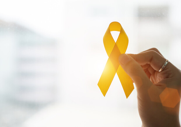 Il nastro giallo, simbolo del sarcoma di Ewing © Ansa