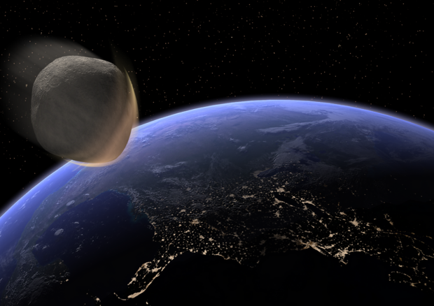 Rappresentazione artistica del passaggio ravvicinato di un asteroide alla Terra (fonte: Kevin Gill da Flickr) © Ansa