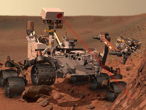 Rappresentazione artistica di Curiosity al lavoro su Marte (fonte: NASA/JPL-Caltech)