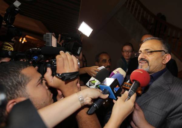 President of the Political Bureau of Islamist Ennahda party, Ameur Larayedh speaks to reporters