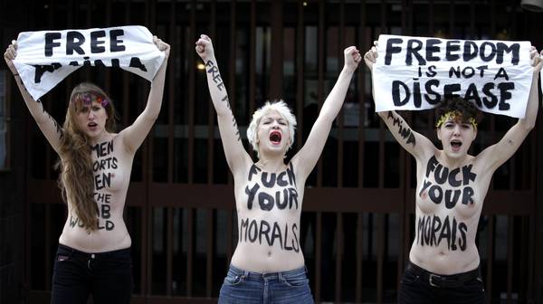 Activists of international feminist group Femen demonstrate in front of the Great Mosque of Brussels