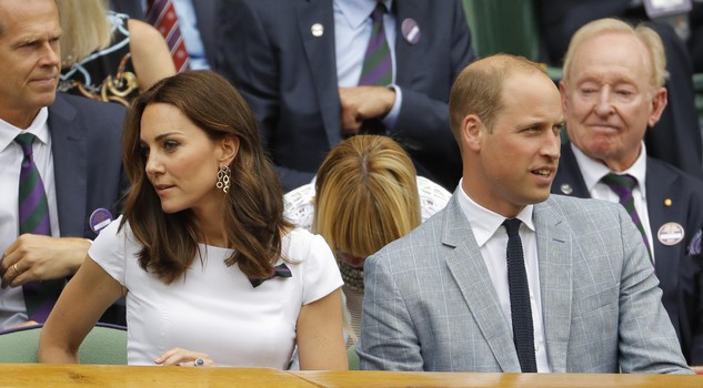 Britain's Prince William and Kate, the Duchess of Cambridge applaud after Switzerland's Roger Federer defeated Croatia's Marin Cilic to win the Men's Singles final match on day thirteen at the Wimbledon Tennis Championships in London Sunday, July 16, 2017