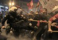 Protesters clash with riot police during a protest in Athens © Ansa
