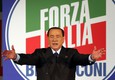 Berlusconi nel suo comizio a Milano © Ansa