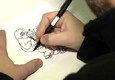 Spataro disegna live e in esclusiva per ANSA una vignetta dedicata a Charlie Hebdo © ANSA