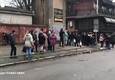 Ucraina, a Kherson cittadini in fila per il cibo © ANSA