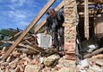 Una casa distrutta a Vilkhivka (ANSA)
