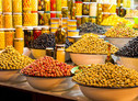 Banco di olive di un mercato in Marocco (ANSA)