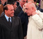 Silvio Berlusconi in compagnia di Adriano Galliani il 30 aprile 1998 al loro arrivo sulle tribune  d'onore dello stadio Olimpico prima dell'inizio della partita di ritorno della finale di Coppa  Italia © ANSA