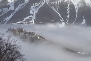 Castelluccio di Norcia immersa in mare nebbia Pian Grande