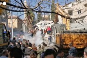 Damasco, servizi di emergenza tra le macerie del palazzo distrutto