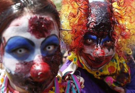 Maschere da zombie-clown © ANSA 