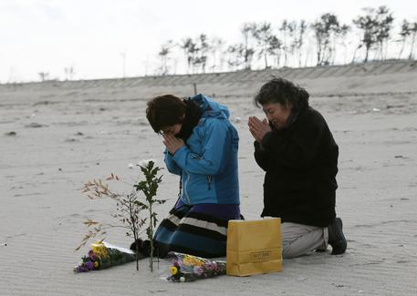 Terzo anniversario del sisma e dello tsunami in Giappone © EPA