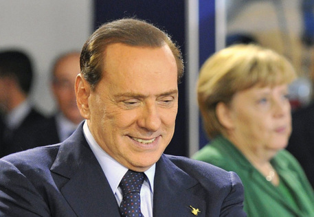 Berlusconi e Merkel © EPA