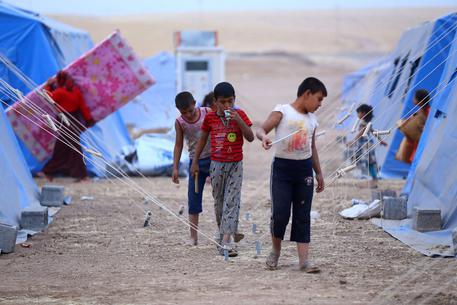 Profughi iracheni nel campo di Erbil © EPA
