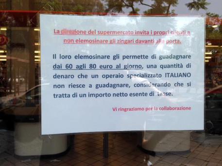 Supermarket posts sign against Roma beggars, denies racism - English ...