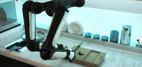 Il robot-chef all'opera nella sua cucina automatizzata (fonte: Moley Robotics) © Ansa