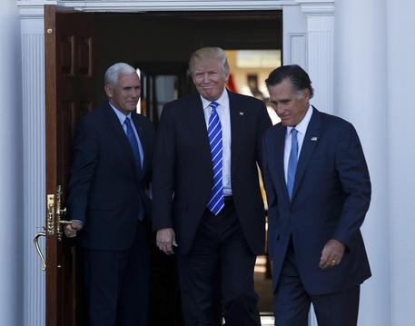 US President-elect Donald Trump and Vice President-elect Mike Pence greet Mitt Romney [ARCHIVE MATERIAL 20161119 ] © ANSA 