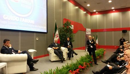 Il ministro Carlo Calenda e il ministro iraniano Nemathzadeh all' apertura dell'Iran Country  presentation alla Fiera di Rom © ANSA