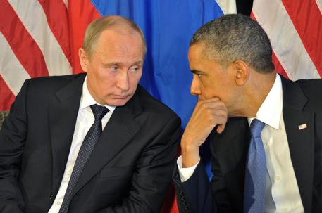 Vladimir Putin e Barack Obama © EPA