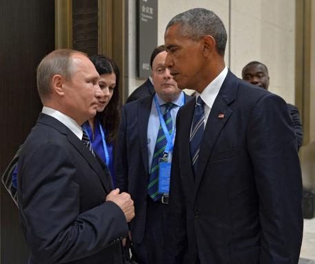 Barack Obama e Vladimir Putin © EPA