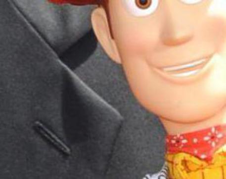John Lasseter con i personaggi-giocattolo di Toy Story © ANSA 