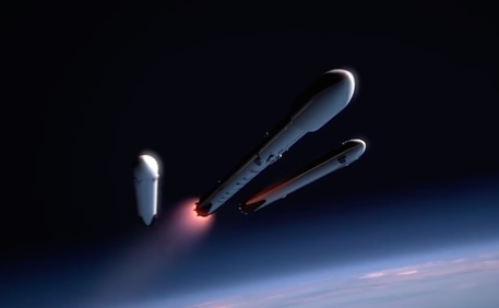 Un'interpretazione artistica del lancio del Falcon Heavy mentre si staccano i due razzi ausiliari (fonte: Space X) © Ansa