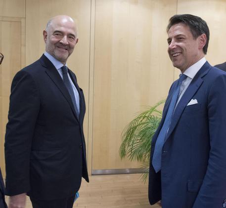 Pierre Moscovici e Giuseppe Conte © ANSA