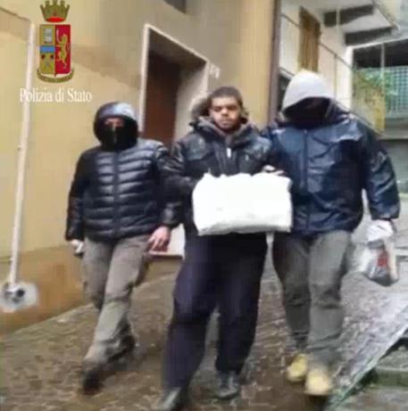 Un fermo immagine tratto da un video della Polizia mostra il 23enne Italo marocchino Elmahdi Halili arrestato a Torino per terrorismo © ANSA