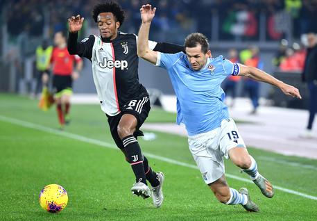 Cuadrado e Lulic in Lazio-Juventus © ANSA