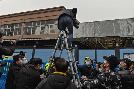 Esperti Oms visitano il mercato di Wuhan, 31 gennaio 2021 © AFP