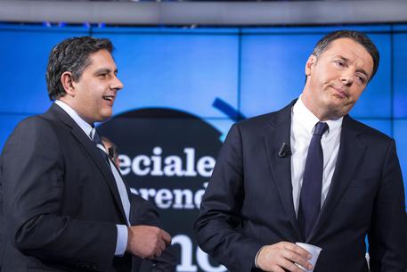Toti e Renzi in uno studio televisivo © ANSA