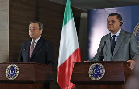 Mario Draghi e  Abdul Hamid Dbeibah © AFP