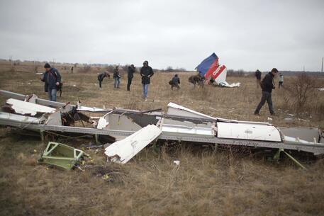 I resti del MH17, abbattuto sull'Ucraina nel 2014 © AFP